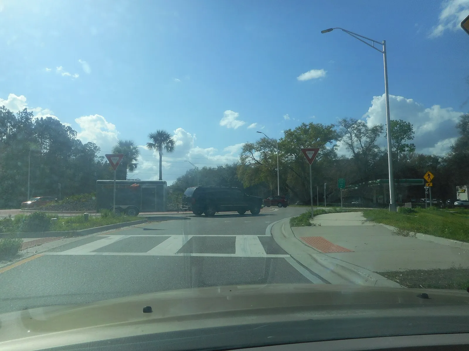 Traffic moves through a roundabout in West DeLand, Florida